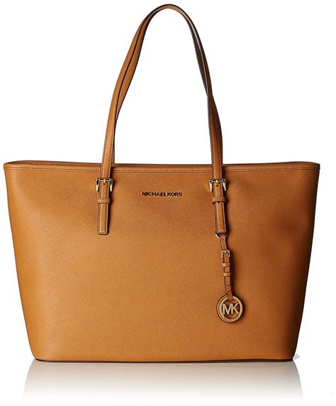 michael kors jet set travel medium top zip tote bag|Michael Kors bag with airplanes.